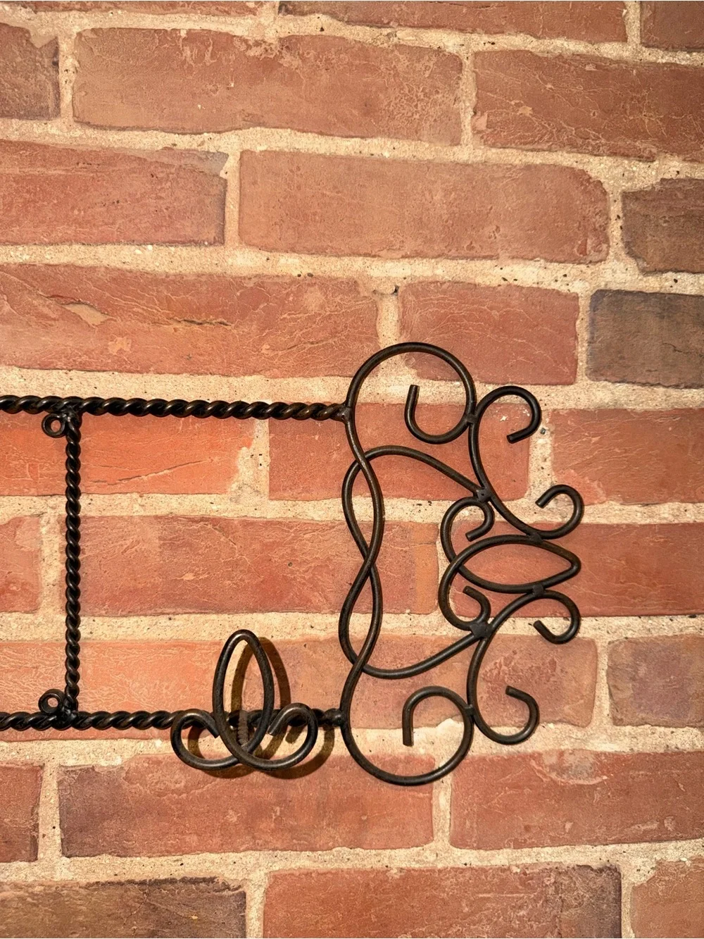 Ornate Black Metal Wall Hook Rack with Scroll Accents